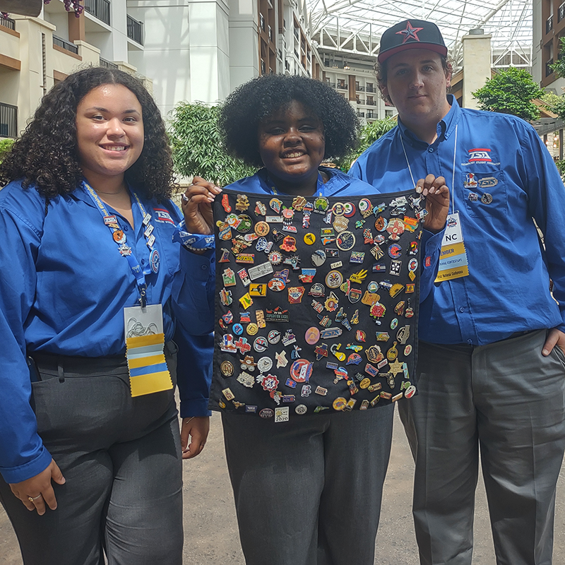 Students trading TSA pins